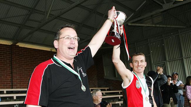 St Kilda City club coach Richard Houston and club captain Shaun Cotter with the premiership cup. Picture: DALE MANN