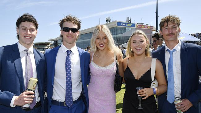 Caulfield Guineas horse race meeting, Caulfield, Victoria, Saturday 12th October 2024. Faces in the crowd. Pictured enjoying the race meeting are Shelton, Henry, Jemima, Tannah and Sam. Picture: Andrew Batsch