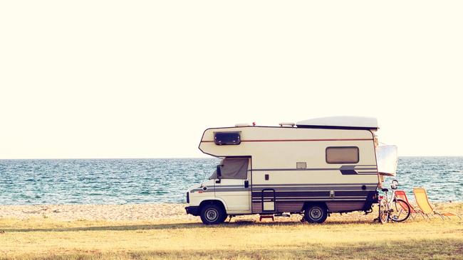ESCAPE: Caravaning. A vintage shoot with a caravan car near the Mediterranean sea in a beautiful summer day. Copy space also. Picture: istock