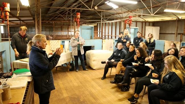 Students tuck in to sourdough bread, made with the Sharkeys’ homegrown flour while Kate talks about biosecurity. Picture: Andy Rogers