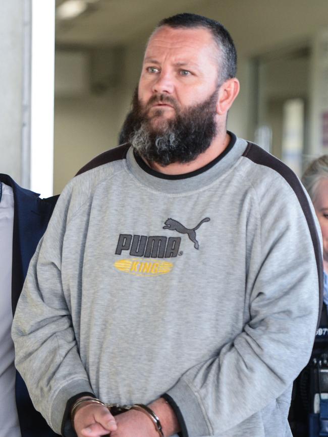 Steven Hainsworth arrives in Adelaide after being extradited from Melbourne. Picture: Brenton Edwards.