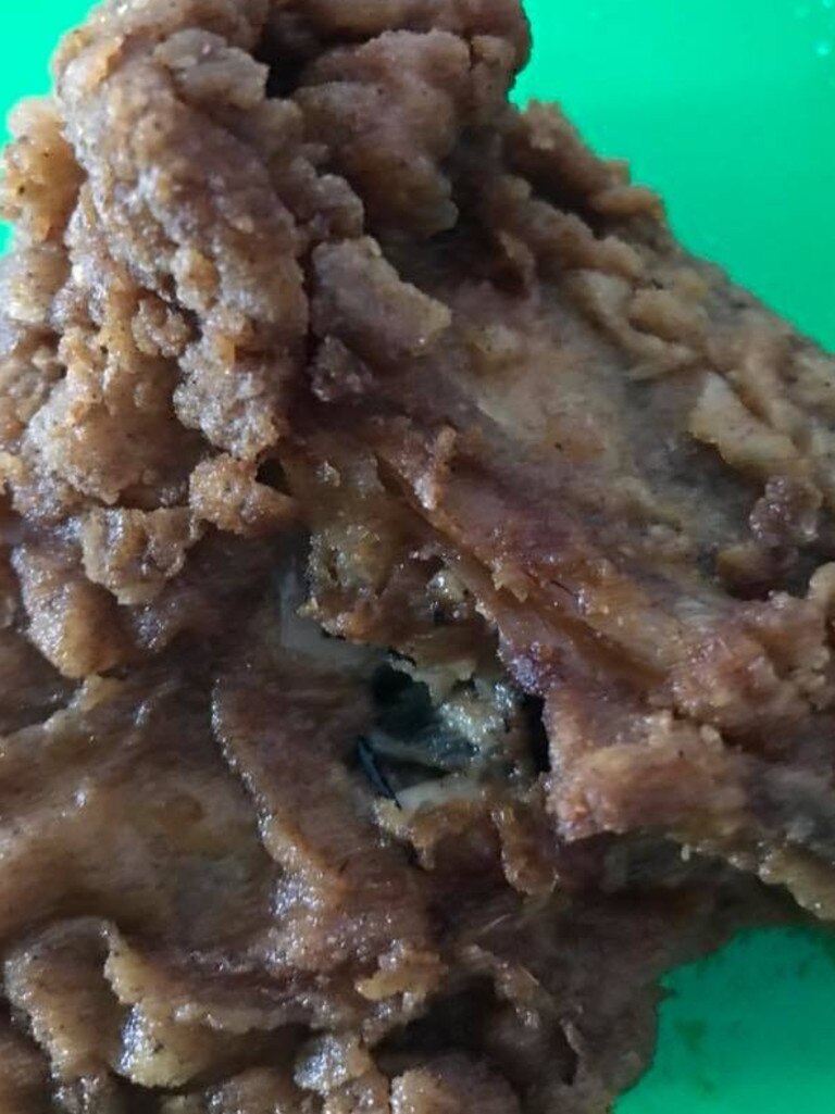 Katie Shearer noticed something black in a piece of fried chicken.