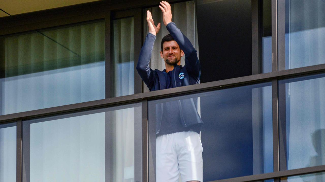 Djokovic on his balcony during quarantine. Picture: AFP Photo