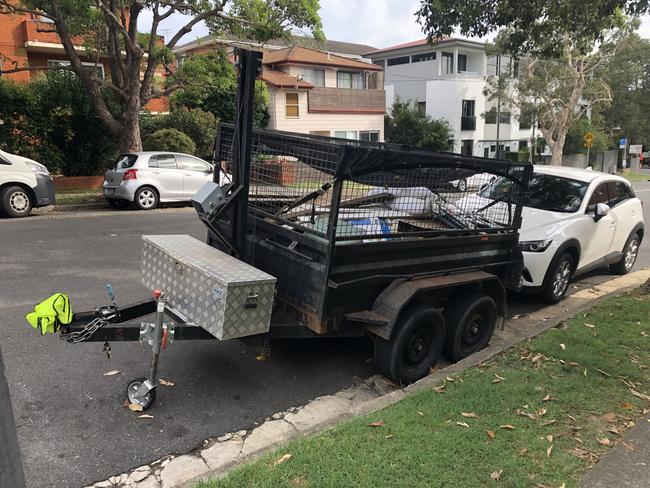 A trailer, with assorted material, parked in Dee Why Pde. Picture: Manly Daily