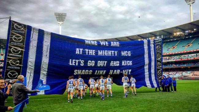 The North Melbourne banner written by Brent Harvey. Picture: Twitter.com/NMFCOfficial