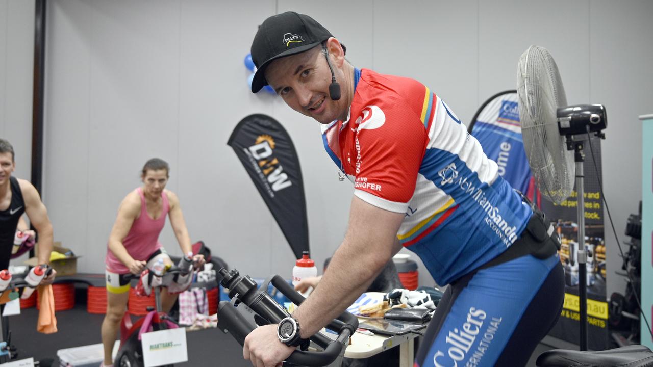 Leading the Guinness World Record attempt at the Longest Static Spin Class at World Gym in Toowoomba Michael Aspinall encourages his other riders. Picture: Bev Lacey