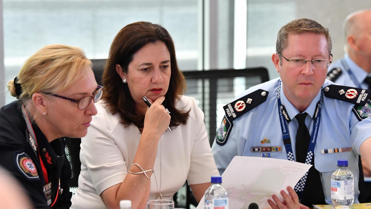 QFES Commissioner Katarina Carroll, Queensland Premier Annastacia Palaszczuk and Deputy Commissioner Bob Gee at Friday’s State Disaster Management Committee meeting addressing Townsville’s flood disaster. (AAP Image/Darren England)