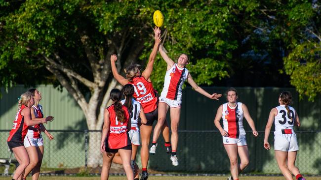 Harlee McIlwain rucks against Burleigh AFC.