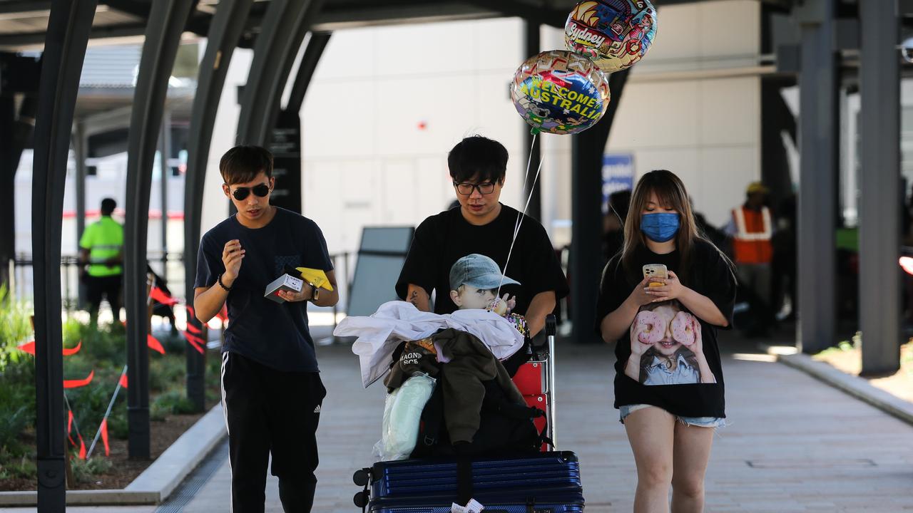 Passengers arrive off a Cathay Pacific flight from Hong Kong at Sydney Airport yesterday. Passengers were required to show evidence of a negative Covid test within 48 hours of their arrival. Picture: NCA NewsWire / Gaye Gerard