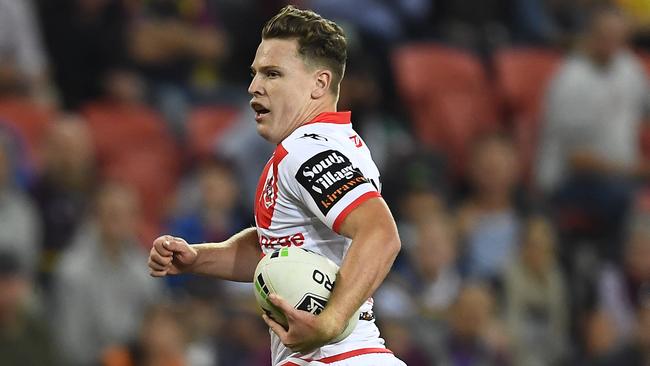 BRISBANE, AUSTRALIA - MAY 11: Jai Field of the Dragons makes a break on his way to score a try during the round nine NRL match between the New Zealand Warriors and the St George Illawarra Dragons at Suncorp Stadium on May 11, 2019 in Brisbane, Australia. (Photo by Ian Hitchcock/Getty Images)