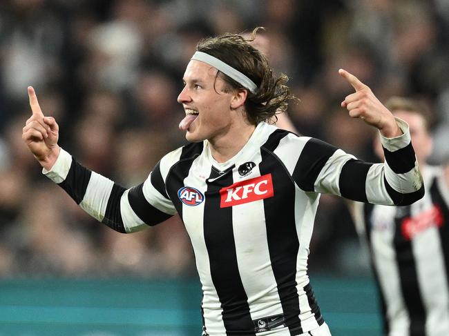 MELBOURNE, AUSTRALIA - AUGUST 25: Jack Ginnivan of the Magpies celebrates kicking a goal during the round 24 AFL match between Essendon Bombers and Collingwood Magpies at Melbourne Cricket Ground, on August 25, 2023, in Melbourne, Australia. (Photo by Quinn Rooney/Getty Images)