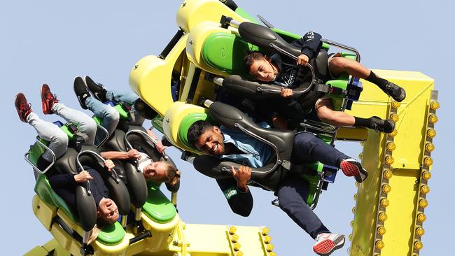 Tyrone Peachey enjoys a ride at Luna Park in Melbourne. Picture: Brett Costello