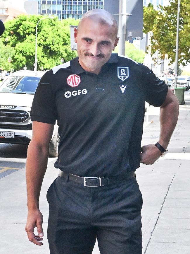 Port Adelaide football player Sam Powell-Pepper outside his lawyers office after a tribunal hearing where he was charged with a high bump on Adelaide player Mark Keane. Picture: NCA NewsWire / Brenton Edwards