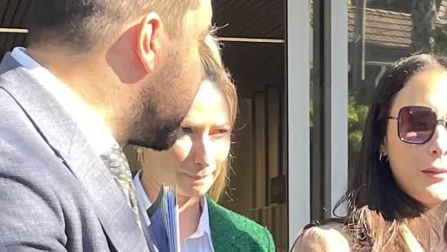 Sarah Diaz, centre, leaving Waverley Local Court. Photo: Bianca Healey