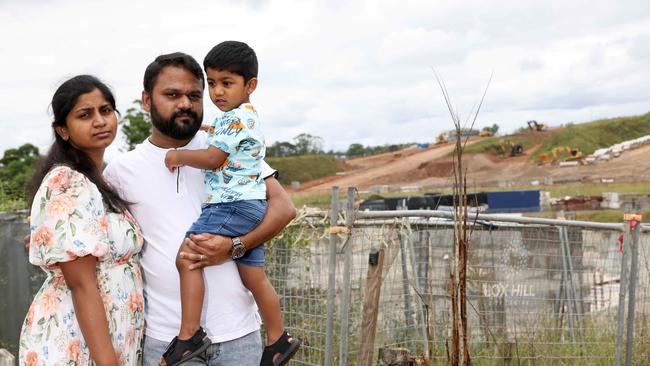 The Vijay family pictured outside the abandoned Box Hill town centre. Picture: Damian Shaw