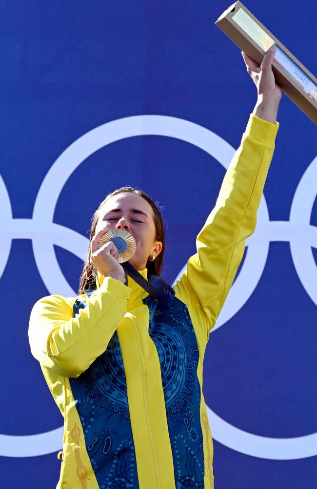 Noemie Fox celebrates on the podium with her gold medal. Picture: AFP