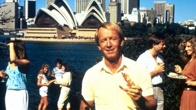 A poster from the Tourism Australian campaign featuring Paul Hogan and "put another shrimp on the barbie", 2004