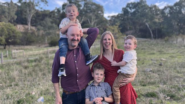 With cost of living pressures biting, Adelaide mum of three Melanie Wegener has become more conscious of limiting unnecessary purchases, while also selling off goods around their home they no longer use to help boost their coffers. She is pictured here with husband Darren and children Finn, 8, Archie, 5, and Banjo, 3. Picture: Supplied.