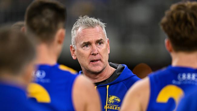 PERTH, AUSTRALIA - AUGUST 12: Adam Simpson, Senior Coach of the Eagles addresses his team and staff at the break during the 2023 AFL Round 22 match between the West Coast Eagles and the Fremantle Dockers at Optus Stadium on August 12, 2023 in Perth, Australia. (Photo by Daniel Carson/AFL Photos via Getty Images)