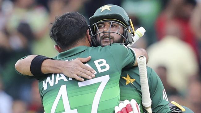 Pakistan's Imad Wasim, right, and Wahab Riaz congratulate each other after their team's victory. Picture: AP