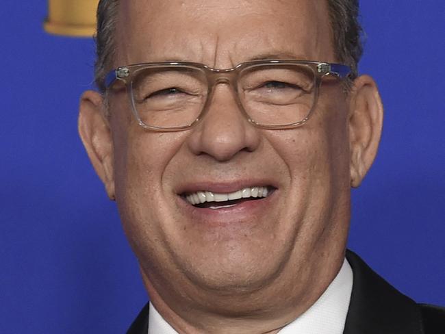 Tom Hanks, winner of the Cecil B. deMille Award, poses in the press room at the 77th annual Golden Globe Awards at the Beverly Hilton Hotel on Sunday, Jan. 5, 2020, in Beverly Hills, Calif. (AP Photo/Chris Pizzello)