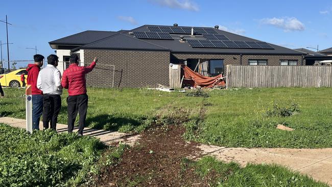 The family surveys the damage. Picture: Nilsson Jones