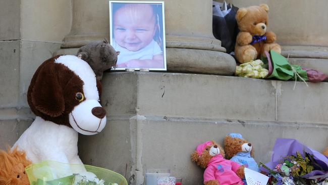 Tributes left for Zachary in Bourke St. Picture: Ian Currie