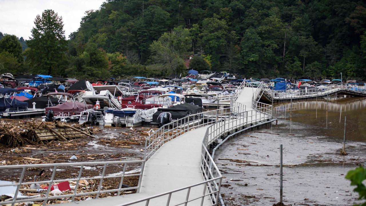 More boats are seen piled up against a walkway bridge on The Rocky Broad River in North Carolina. Picture: Melissa Sue Gerrits/Getty Images/AFP (