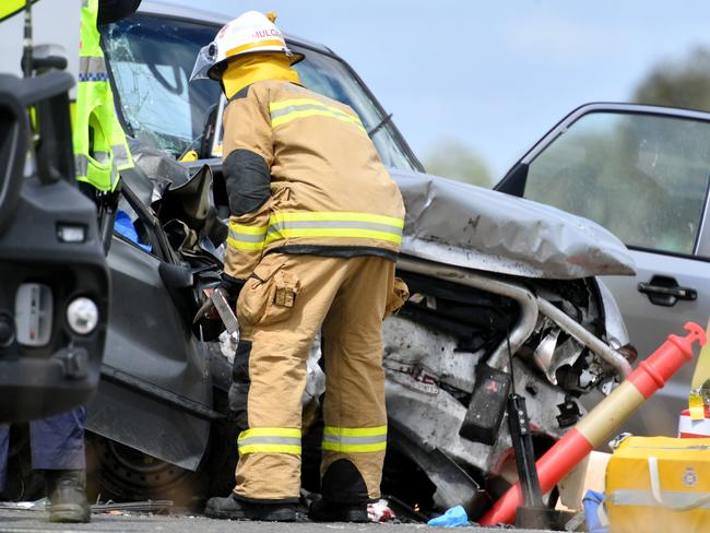 Emergency services attend a 3 person fatal crash involving four vehicles south of Townsville. Picture: Alix Sweeney