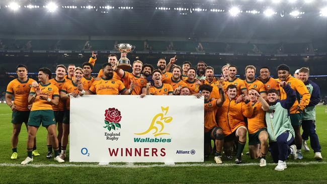 The Wallabies celebrate with the Ella Mobbs Cup after their victory over England last weekend. Picture: David Rogers/Getty Images