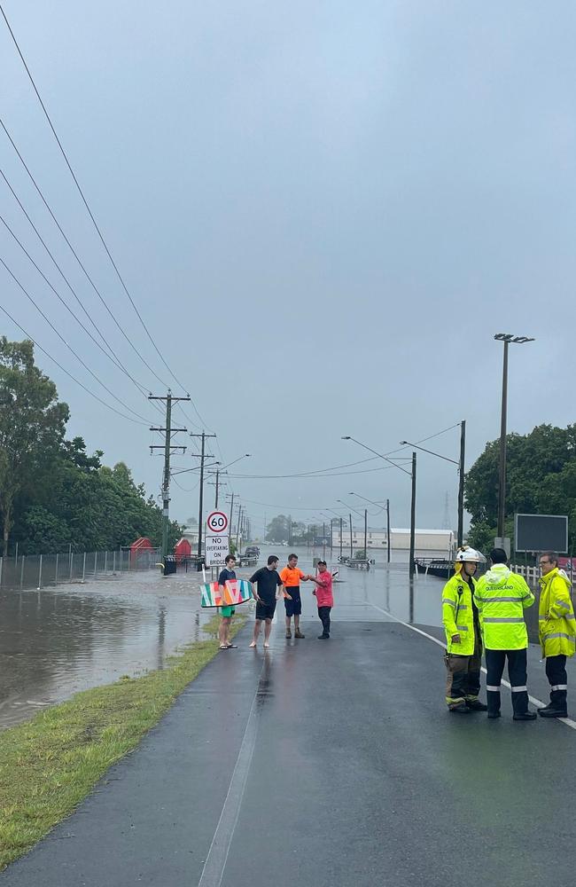 Drivers risk death as flooded Mackay roads left open without signage