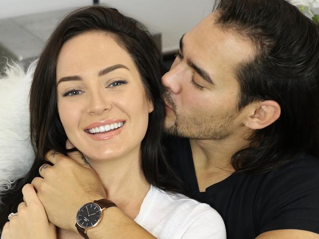 Chloe Morello and her husband, Sebastian Mecha, who drew the image on her skirt.