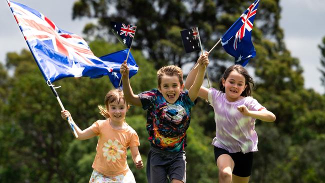 Emelia, 7, Logan Delport, 6, Summer Dunn, 7, enjoy their Australia Day celebrations in Parramatta Park. Photo: Tom Parrish