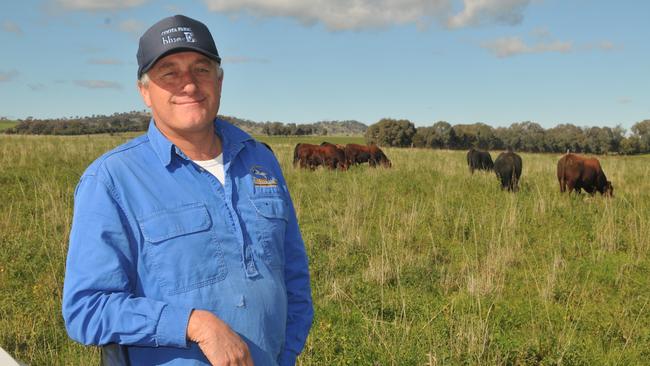 Jon Wright of Coota Park Blue-E stud at Woodstock in NSW with some of his composite cattle. Picture: James Wagstaff