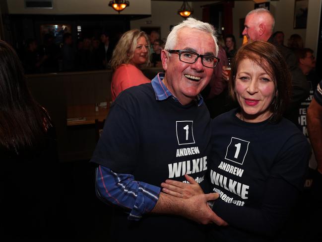 Independent member for Clark, Andrew Wilkie celebrates his win with partner Dr Clare Ballingall at the Tasmanian Inn in Hobart. Picture: NIKKI DAVIS-JONES