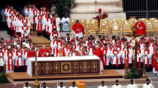 German Cardinal Joseph Ratzinger, centre of the altar, celebrates the funeral service for Pope John Paul II outside St. Peter's Basilica at the Vatican. Picture: AP