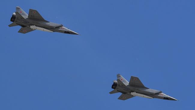 Russia's MiG-31 supersonic interceptor jets carrying hypersonic Kinzhal (Dagger) missiles. Picture: AFP