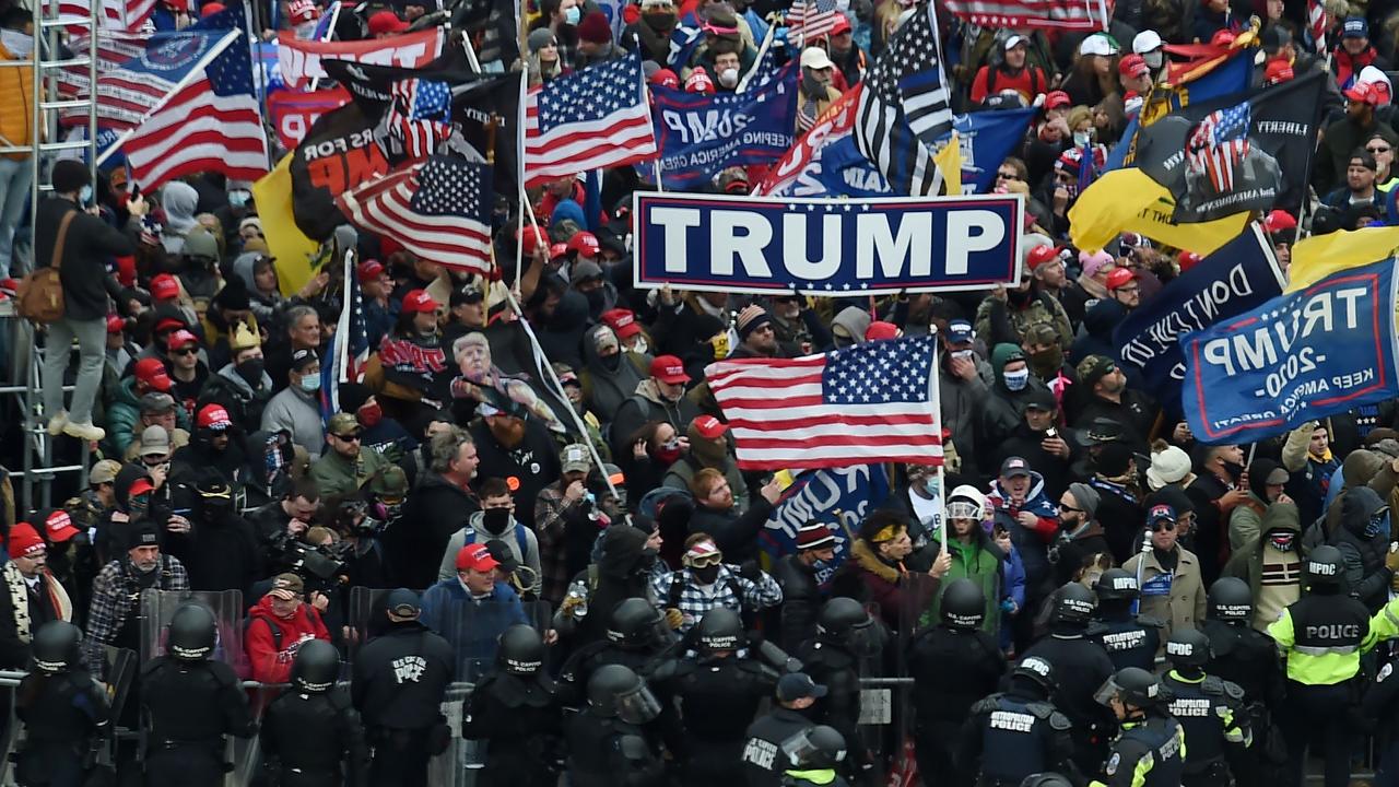 Police tried to hold back Trump supporters as they gathered outside the US Capitol’s Rotunda. Picture: Olivier Douliery/AFP