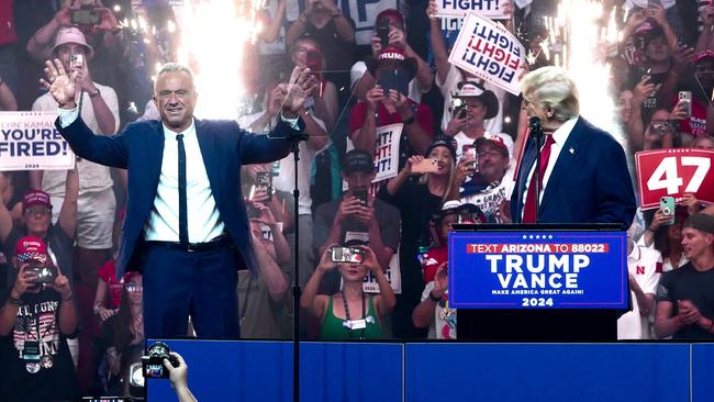 Donald Trump welcomes Robert F. Kennedy Jr. on stage at a campaign rally in Arizona. Picture; AFP.