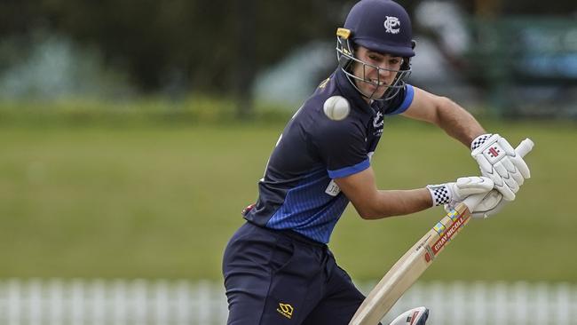 Prahran batsman Damon Egan on his way to a century in last season’s grand final against Dandenong. Picture: Valeriu Campan