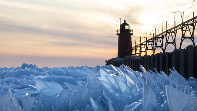 Shards of ice pile up on Lake Michigan along the South Haven Pier in South Haven, Michigan. Picture: Joel Bissell/Kalamazoo Gazette via AP