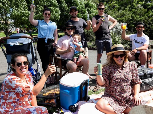 Melburnians gather in Footscray Park opposite Flemington Racecourse to cheer on the horses. Picture: Ian Currie/NCA NewsWire