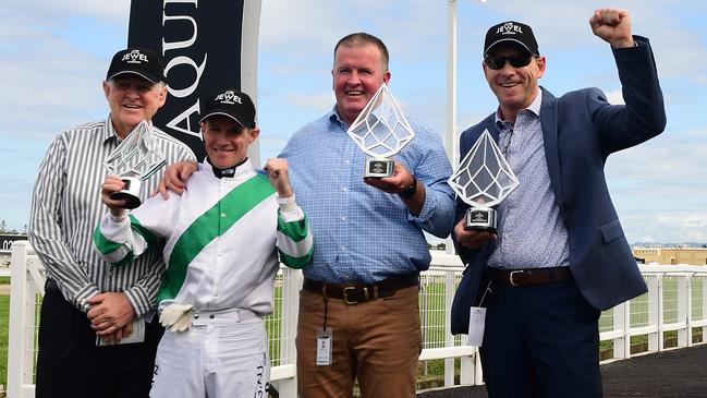 Kisukano owners Peter (left) and Robert (right) Reeves with jockey Mark Du Plessis and trainer Michael Nolan after the QTIS Jewel at the Gold Coast. Picture: Trackside Photography