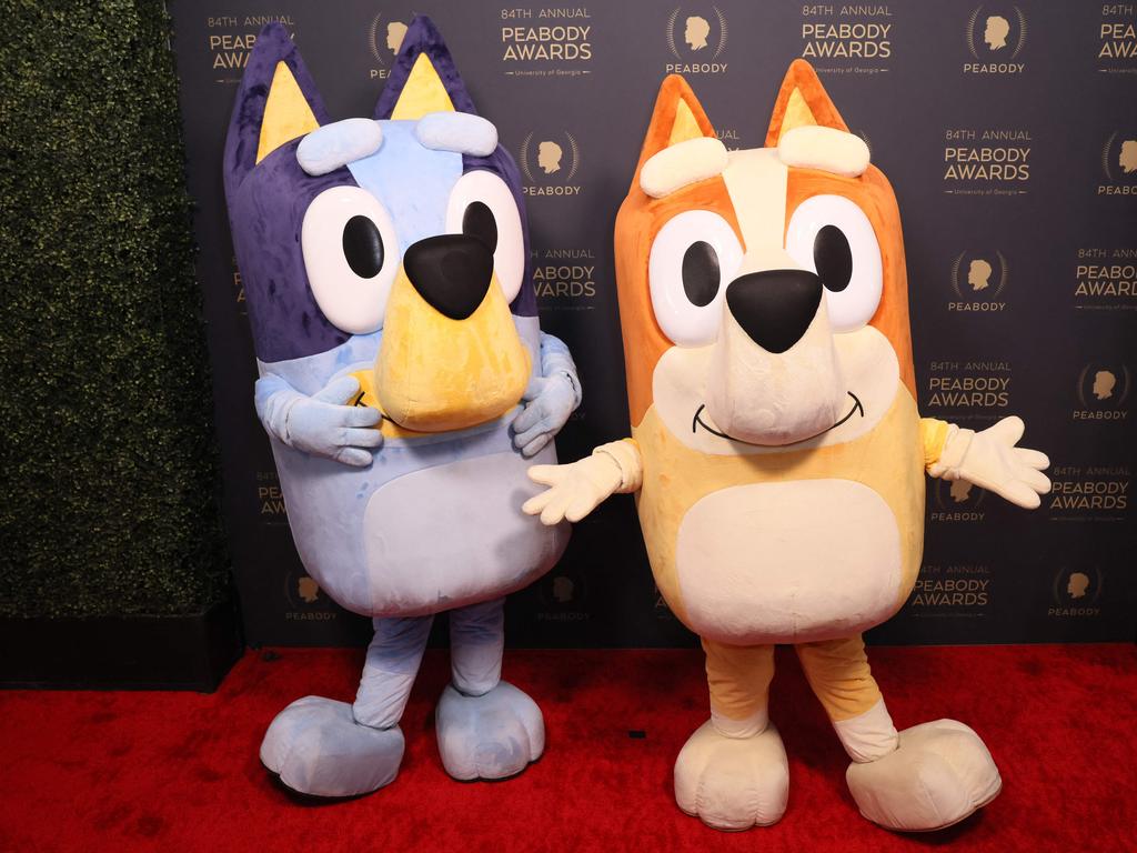 "Bluey" animation characters arrive for the 84th Peabody Awards at the Beverly Wilshire Hotel in Beverly Hills, California on June 9, 2024. (Photo by Etienne LAURENT / AFP)