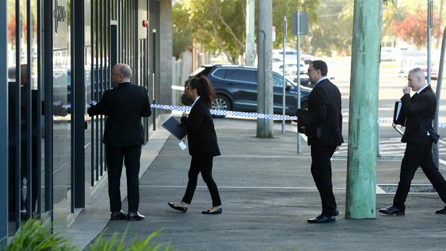 Detectives entering The Mercer building after a body was found on Malone St in Geelong. Picture: Alison Wynd