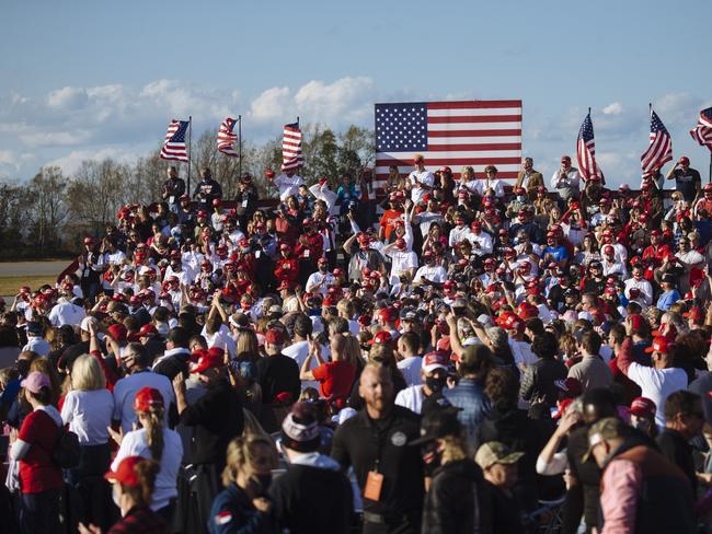 A crowd of thousands waits for Donald Trump at a rally in Hickory, North Carolina. Picture: Angus Mordant