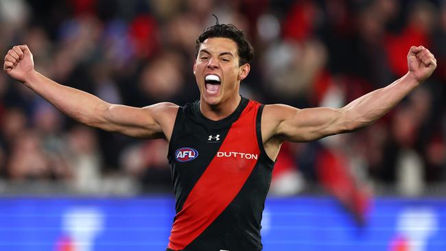 MELBOURNE, AUSTRALIA - JULY 05: Jye Caldwell of the Bombers celebrates winning the round 17 AFL match between Collingwood Magpies and Essendon Bombers at Melbourne Cricket Ground, on July 05, 2024, in Melbourne, Australia. (Photo by Quinn Rooney/Getty Images)