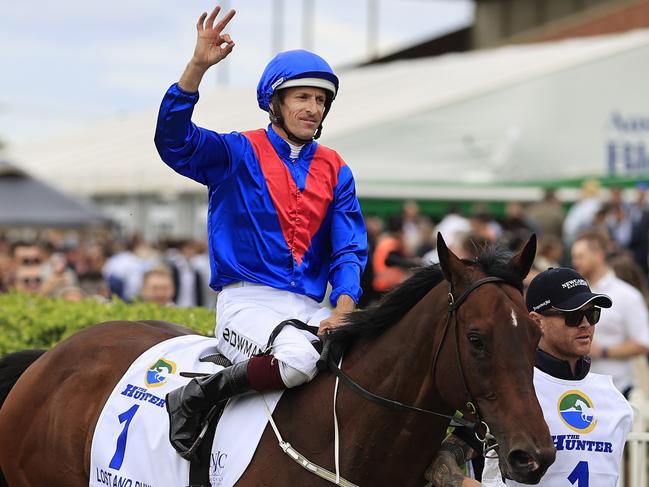 NEWCASTLE, AUSTRALIA - NOVEMBER 13: Hugh Bowman on Lost And Running returns to scale after winning race 8 the Hunter during Sydney Racing at Newcastle Racecourse on November 13, 2021 in Newcastle, Australia. (Photo by Mark Evans/Getty Images)