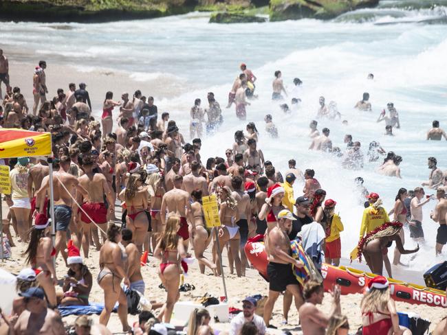 The swell was high during the Christmas Day festivities. Picture: Daily Telegraph/ Monique Harmer