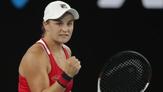 Australia's Ashleigh Barty reacts after defeating Italy's Camila Giorgi. (AP Photo/Vincent Thian)